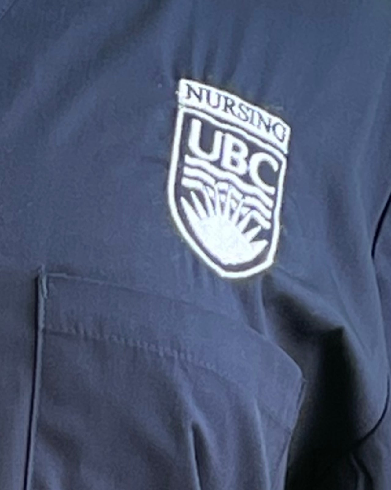 Nicole Top UBC Logo